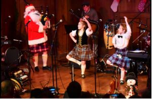 Young dancers and Santa Claus